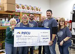 P1FCU Employees Give Donation Check P1FCU Employees Give Donation Check